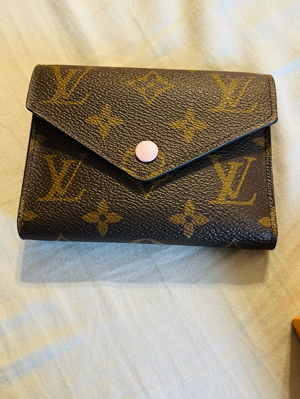 Louis Vuitton Monogram Canvas Wallet with Pink Snap Closure